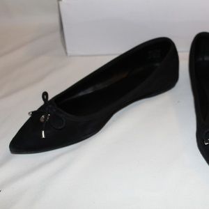 Black pointy flats